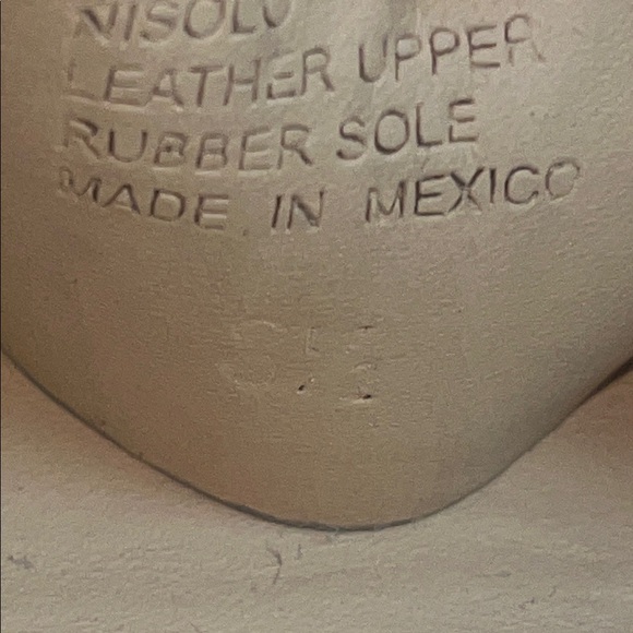 Nisolo Gray Leather Sandals with Chic Elevation on wooden platform. - Picture 10 of 11